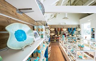 A spacious store featuring a variety of products that create a welcoming atmosphere | MSC Cruises
