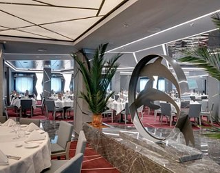 The modern restaurant offers a cozy atmosphere and stunning sea views | MSC Cruises