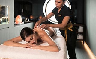 A relaxing spa treatment experience with a skilled therapist providing a massage in a tranquil setting | MSC Cruises