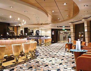 Bar élégant avec des sièges confortables pour se détendre et socialiser | MSC Croisières