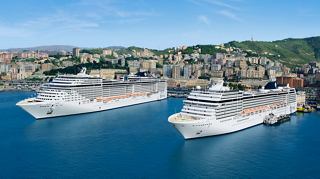 Two MSC cruise ships docked in a scenic harbour surrounded by lush greenery and urban architecture | MSC Cruises