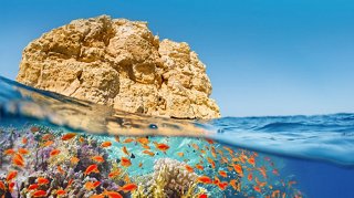 Crystal blue sea and golden rocks create an idyllic setting for relaxation | MSC Cruises