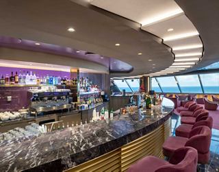 MSC Grandiosa Guests relaxing in the Yacht Club Top Sail Lounge | MSC Cruises