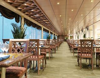 A spacious restaurant featuring a welcoming atmosphere and delicious cuisine | MSC Cruises